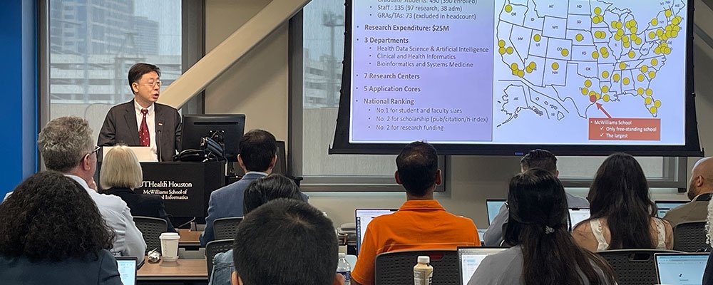 Dean Jiajie Zhang, PhD addressing the audience at the inaugural “Generative AI Now!” workshop, hosted by McWilliams School of Biomedical Informatics at UTHealth Houston. (Photo by Angela Douglas/UTHealth Houston)