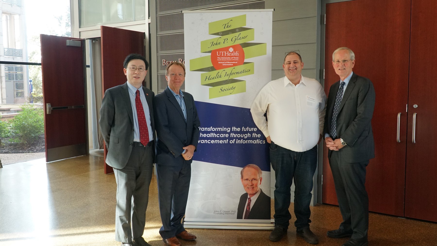 SBMI Dean, Jiajie Zhang; Steve Lieber, 2018 Glaser Award recipient; Grahame Grieve, 2019 Glaser Award recipient; and John P. Glaser, Founding Member, Glaser Society.