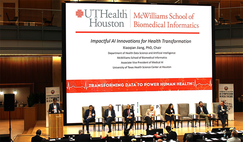 Xiaoqian Jiang, PhD presents information at the 2025 UT System AI Symposium for Health Care (Photo by David Fanucchi/UTHealth Houston)