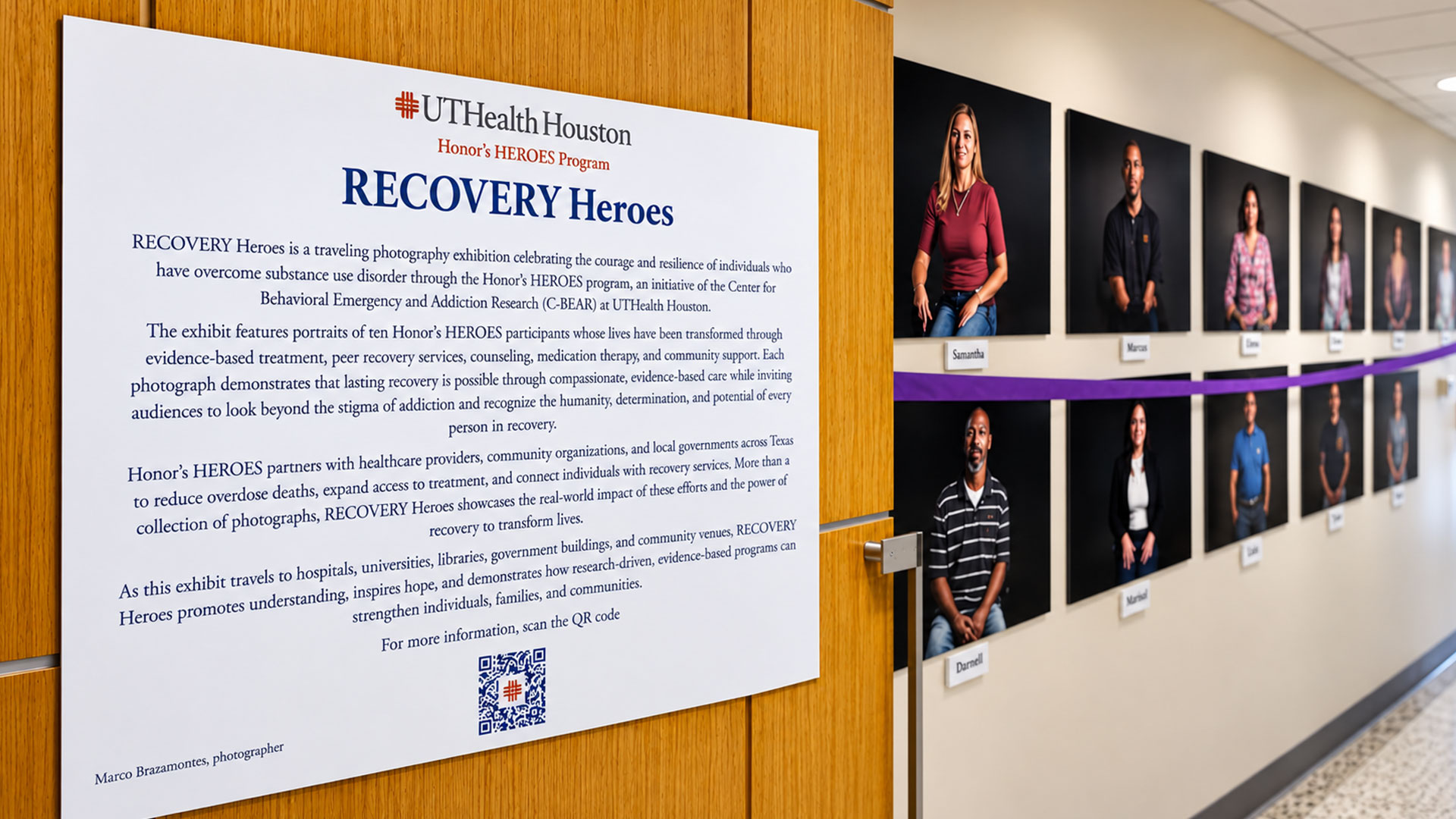 Display for UTHealth Houston’s “Recovery Heroes” photography exhibit, featuring an informational sign and portrait photographs of program participants displayed along a hallway wall.